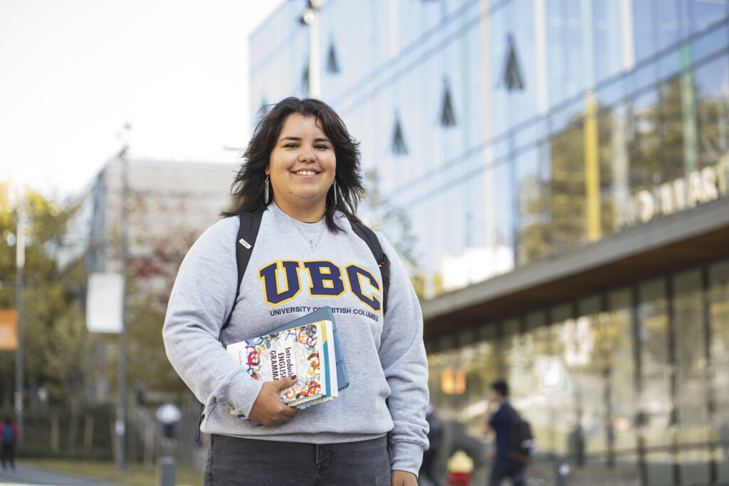 Indigenous student wearing UBC shirt, supported by BC First Nations Scholarship