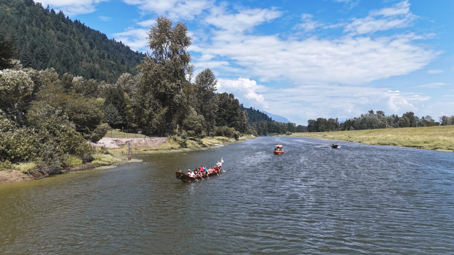 Sumas First Nation youth paddling together during their annual canoe journey, supported by the NRT Youth Grant.